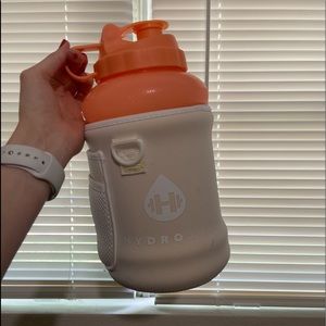 coral hydro jug with cream sleeve